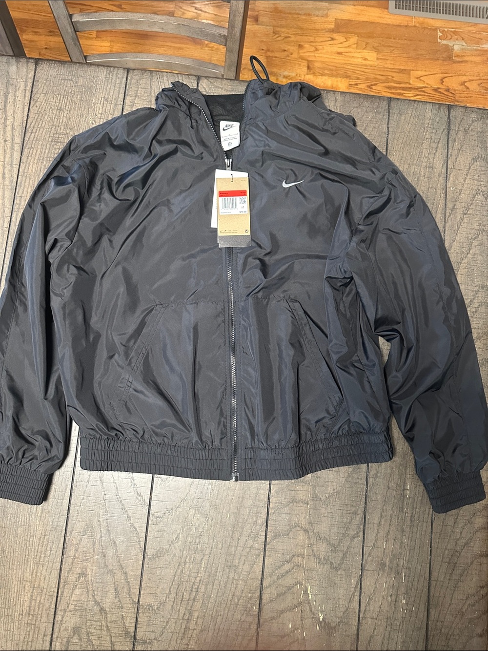 Nike women’s Black Lightweight Packable Windbreaker Jacket